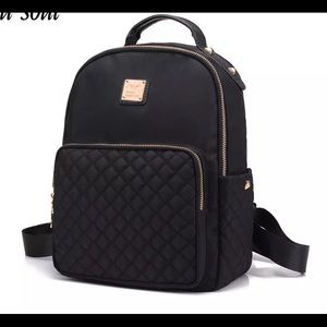 Small Black Backpack wth gold accents
